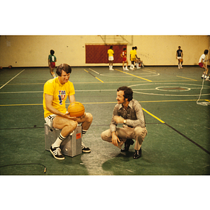 Basketball practice of Young Men's Christian Association team