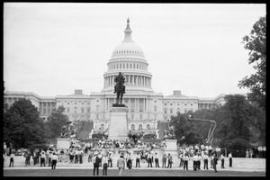 Police lined up in front of the U.S. Capitol Building, awaiting the peace marchers