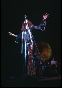 Janis Joplin performing onstage at the Woodstock Festival