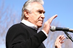 Congressman Maurice D. Hinchey at the microphone, addressing protesters: rally and march against the Iraq War