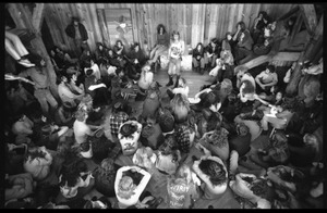 Michael Metelica addressing a crowd of commune members at a meeting inside the Brotherhood of the Spirit dormitory, Warwick, Mass. (view from above)