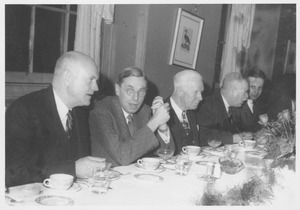 Ralph A. Van Meter at banquet table