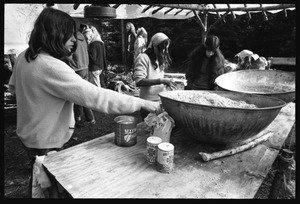Preparing a communal meal under a makeshift shelter, Earth People's Park