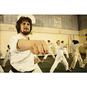 Group of students practicing martial arts