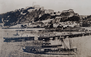 Postcard view of a ferry boat and a pier, with Ehrenbreitstein Fortress in the background, Coblenz, Germany