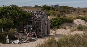 Shed near Fowler Cottage Dune Shack with fishing buoys, Provincetown