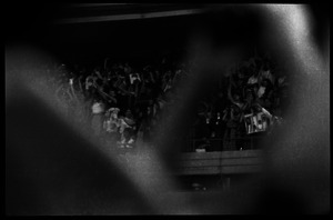 Beatles concert at Shea Stadium: shot of the screaming crowd in the upper deck