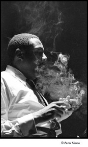 United States Student Press Association Congress: Dick Gregory lighting a cigarette