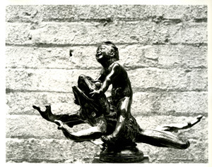 Frog and rider statuette