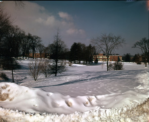 View of snow on campus, with Machmer Hall, Student Union, and Goessmann Laboratory (l. to r.) in background