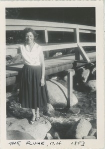 Bernice Kahn posing next to wooden bridge