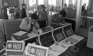 Unidentified call center workers in Boston Police Dispatch Operations Center