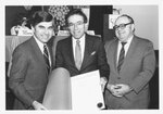 Governor Michael Dukakis, President Daniel H. Perlman (1980-1989), and Dean Michael R. Ronayne at the Suffolk University's College of Liberal Arts and Sciences CLAS 50th Anniversary Colloquium, photograph, 2/20/1984