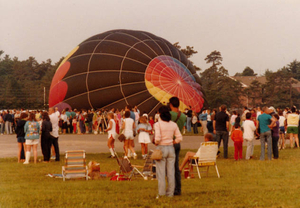 Crowd shot of hot air balloon on ground