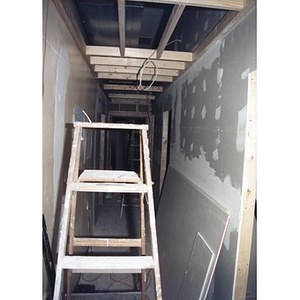 Interior framing and drywall construction during the renovation process at 326 Shawmut Avenue.
