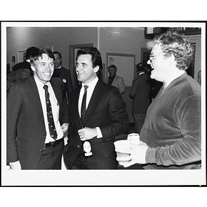 Three men laugh together at the South Boston Boys & Girls Club Alumni Party