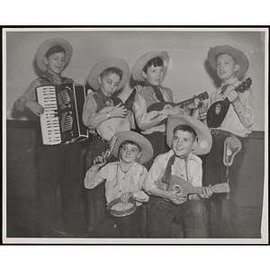 The Bunker Hillbillies pose for a group photo with their instruments