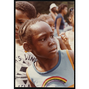 A child watches the events at the Tri-Club Field Day at the Roxbury Clubhouse