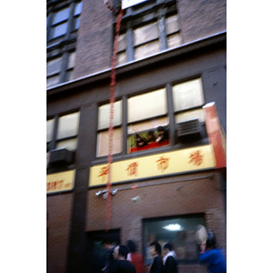 Dragon Dance performance outside Chinese Progressive Association headquarters