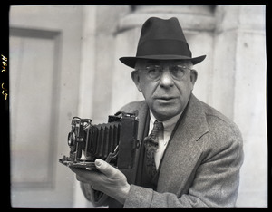 Sam Connor and Bob Emery: man posed with a Zeiss Ikon Super Ikonta camera