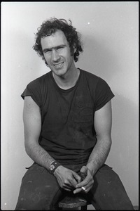 Studio portrait of Richard Safft, seated on a stool