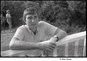 John Updike portrait, with boy and girl in the background