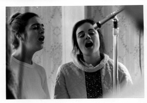 Two unidentified women singing
