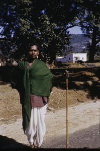 Man holding a staff near Ranchi