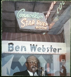 Ben Webster: playing saxophone while reflected in the window of Connolly's Star Dust Room
