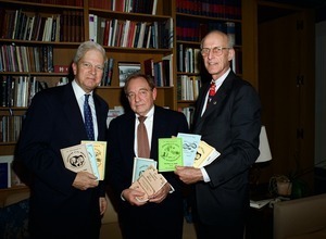 Congressman John W. Olver: with two unidentified men holding pamphlets relating to the Annual Festival of the Hills in Conway, Mass.