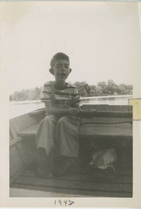 Joel Kahn in small boat on Jamaica Pond