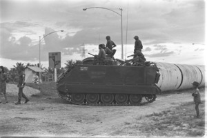 Armored personnel company joins coup troops on Saigon¿Bienhoa highway; Saigon.