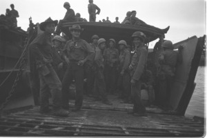 Vietnamese troops embarking river craft at Tan Phu for action against guerrillas in delta; Mekong Delta.