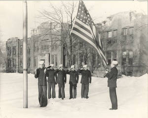 Navy Mates Lowering Flag (February 28, 1946)