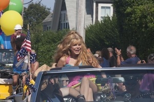 Grand Marshall Charo riding in the parade : Provincetown Carnival parade