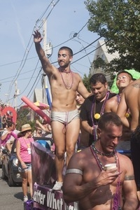 Parade marchers in skimpy outfits : Provincetown Carnival parade
