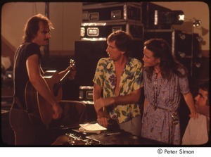 MUSE concert and rally: (l-r) James Taylor, Graham Nash, unidentified woman, and Don Grolnick rehearsing