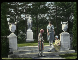 A. H. Dakin garden (women gathered on stone steps near urns and statue)