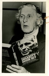 Kenneth Donaldson holding copy of his book 'Insanity Inside Out'