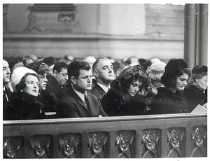 Rose Kennedy, Massachusetts Senator Edward Kennedy, Joan Kennedy, and Jacqueline Kennedy seated in a church