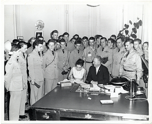 Mayor John F. Collins with unidentified individuals