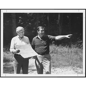 Two men surveying landscape at unidentified YMCA camp