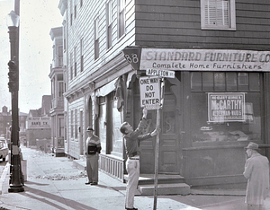 Removing political signs on Main St. 1960