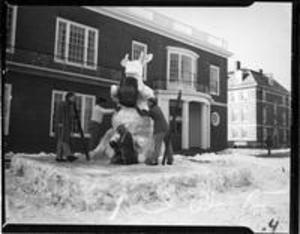 Students working on cow snow sculpture, 1959