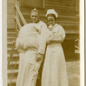 Camp MacArthur - Waco, Texas - World War I - A Patient in costume and a nurse with a baby doll