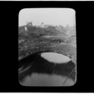 Water flowing beneath bridges