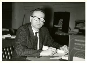 Suffolk University Professor Benson Diamond (CAS) sitting at his desk