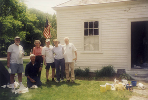 Volunteers paint Mellon law offices