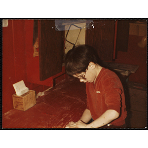 A boy working on a project for his woodworking class at the Boys and Girls Club