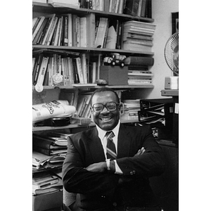 Dr. Joseph Warren, Director of Community Affairs, sitting in his office